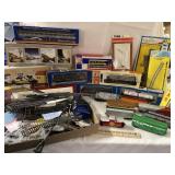 Train lot full of trains and track parts