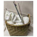 Wicker basket with knitting items