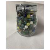 Vintage jar stamped Triomphe Full of marbles just