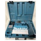 Makita screw gun with charger, missing battery