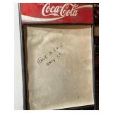 Coca-Cola advertisement, with whiteboard.