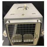 Pet carrier with food & water tray