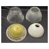 Lot of 4 lamp shades/ covers of various sizes.