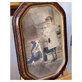 Vintage photo of girl with her dog. Has bowed