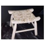White wicker stool, measures 15 1/2 inches 10 1/2