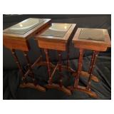 Mahogany  glass top nesting table set. The big