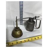 Two vintage metal oiling cans