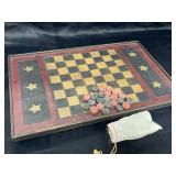Vintage checkers board with wooden pieces