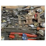 Lot of drill bits, tools and misc plumbing parts.