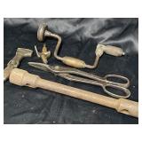 Vintage tools, pipe wrench, hand drill and more.