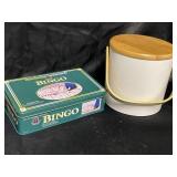 Bingo in a metal tin and white ice bucket