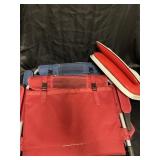 Folding stadium seats. 1 red, 1 blue and 1 red