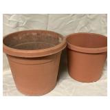 Plastic outdoor pots. One is 11 inch tall and the