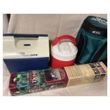 Camping lot includes a dome tent, igloo thermos