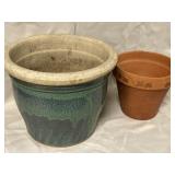 Two ceramic flower pots. One measures 10 inches
