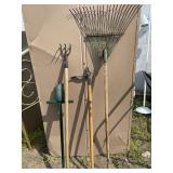 Outdoor tools including metal rake and more.