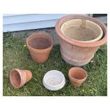 Lot of flower pots, all different sizes