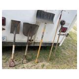 Nice yard lot with a metal snow shovel, hoe,