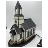 Stained glass church, lights up.