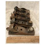 One Stanley and 4 unmarked Planes