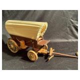 Wooden toy wagon, seems to be missing the horses.