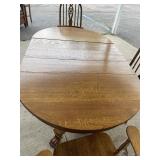Oval antique table with three leaves, two