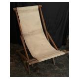 Folding wood beach chair.