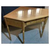 Ethan Allen wood corner desk with one drawer.