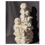 Garden Angles, stands 17 inches tall. See photos