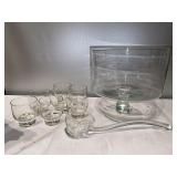 O- punch bowl, 7 cups and a ladle.