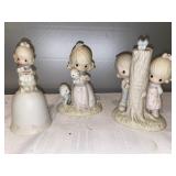 L- Precious moments figurines. Mother