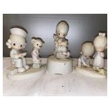 L- Precious moments figurines. The purr-fact