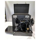 L- singer sewing machine and box