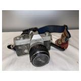 K- Canon FTb with Zoom Lens with shoulder strap