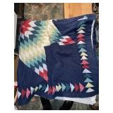 K- multi colored quilt