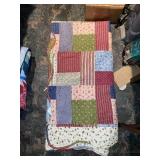 K- multi colored quilt