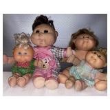 G- cabbage patch dolls, 4 total.