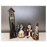 G- Christmas decorations Santa is missing a shoe.