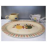 G- turkey platter, watering can and tea pot.