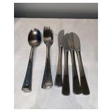 G- silverware set. 3 spoons, 5 forks and 4 butter