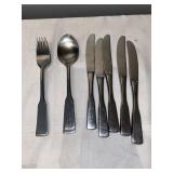 G- silverware set. 4 forks, 4 spoons and 5 butter