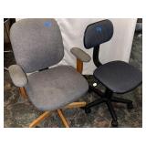 Light gray office chair missing wheel and dark