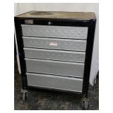 Gladiator Cadet rolling tool chest with keys.
