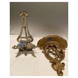 (W) Cast Iron Picture Frame Holder and a wall