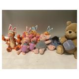 Assortment of Winnie the Pooh stuffed animals