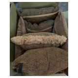 Box of decorative pillows