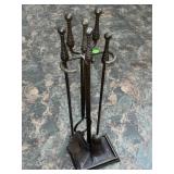 FL) Cast iron fireplace set.