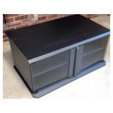 FL) TV stand with glass doors.