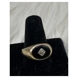Size 10 - 10k gold band with diamond chip