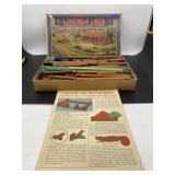 (R10). Lincoln Logs  Complete Set with wheels in